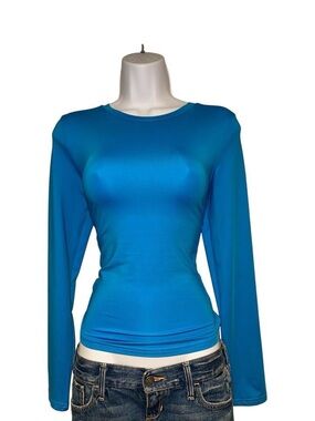 Bright blue long sleeve top with stretchy material